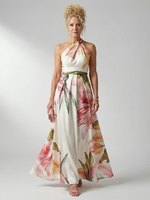 Floral halter maxi dress with pink-and-green print, gathered waist and full skirt