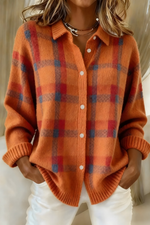 Orange plaid knit cardigan with button front, collared V-neck, long sleeves, ribbed cuffs