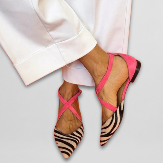 Pink-strap ballet flats with zebra print uppers and pointed toe