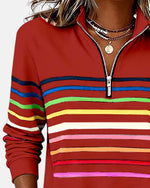 Red rainbow-striped quarter-zip sweatshirt with ribbed cuffs and hem