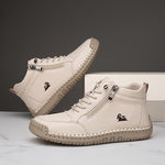 Ivory ergonomic support sneaker with lace-up front, side zipper, and textured rubber sole