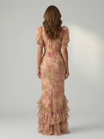 Floral high-neck maxi dress, back view with puff sleeves and ruffled hem