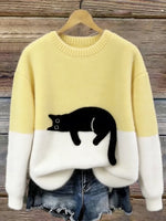 Yellow cat print fuzzy sweater with white cuffs and hem