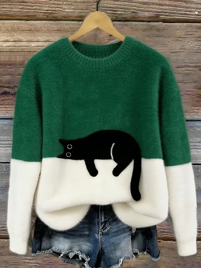 Green cat print fuzzy sweater with white cuffs and hem
