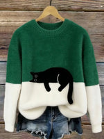 Green cat print fuzzy sweater with white cuffs and hem