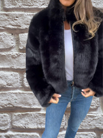 Black faux-fur warm coat with full zip and stand collar