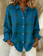 Blue plaid knit cardigan with button front, collared V-neck, long sleeves, ribbed cuffs