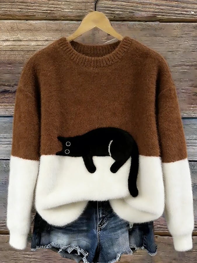 Brown cat print fuzzy sweater with white cuffs and hem