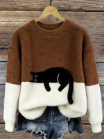 Brown cat print fuzzy sweater with white cuffs and hem