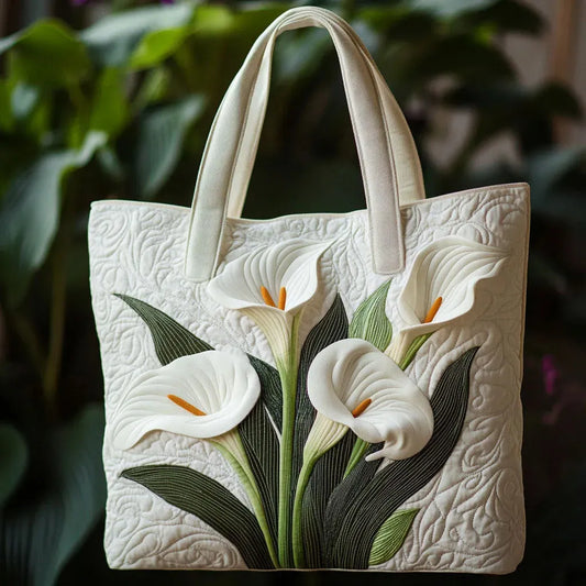 White quilted tote bag with floral lily applique and padded top handles