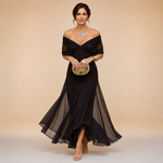 Black off-shoulder maxi dress with draped twist bodice and layered chiffon skirt