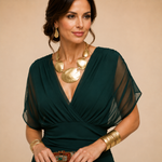 Dark green V-neck maxi dress bodice with draped twist detail and sheer sleeve overlay