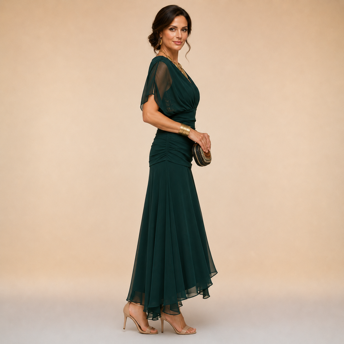 Dark green fitted maxi dress with V-neck and layered chiffon skirt, short sleeves