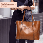Eleonora vintage leather tote bag in brown, styled on person with front pocket and straps