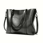 Eleonora vintage leather tote bag in black leather with long handles and crossbody strap
