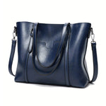 Eleonora vintage leather tote bag in blue leather with long handles and crossbody strap