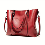 Vintage leather tote bag, maroon with U-shaped front pocket and shoulder straps