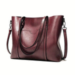 Vintage leather tote bag, burgundy with top handles and crossbody shoulder straps