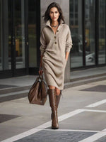 Beige knit sweater dress with long sleeves and button front, midi length