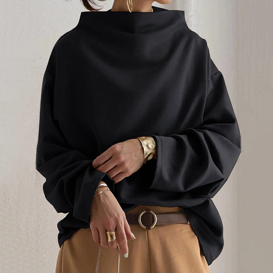 Black high-neck top with long sleeves and loose draped fit