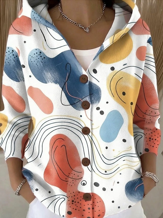 White hooded cardigan with colorful abstract blob print and button front