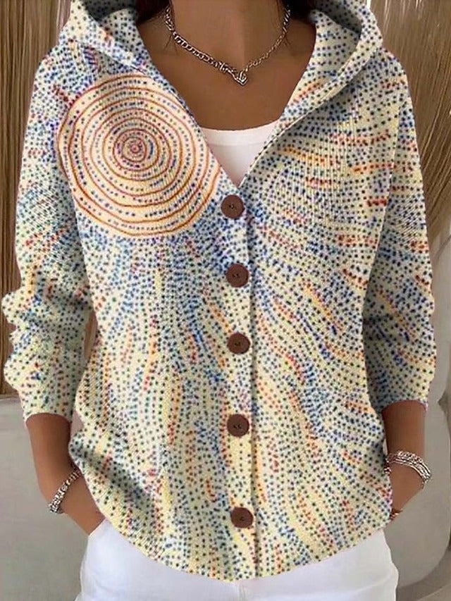 Cream hooded cardigan with multicolor dot and spiral print and button front