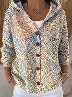 Cream hooded cardigan with multicolor dot and spiral print and button front