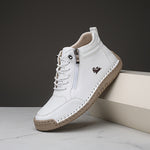 White ergonomic support sneakers with lace-up front and side zipper