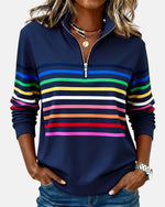 Navy quarter-zip sweatshirt with rainbow horizontal striped bands on chest and sleeves