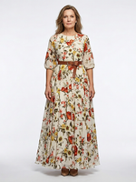 Floral belted maxi dress with round neck, three-quarter sleeves, and tiered skirt