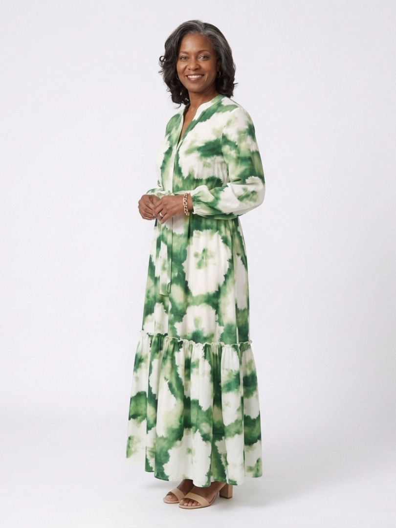 Green and white tie-waist tiered maxi dress with long sleeves and ruffled tiers