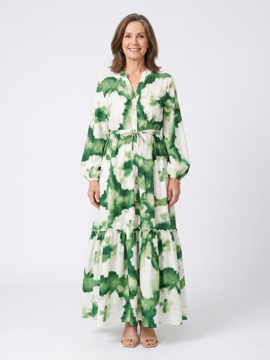 Green and white tie-waist tiered maxi dress with long sleeves and V-neck