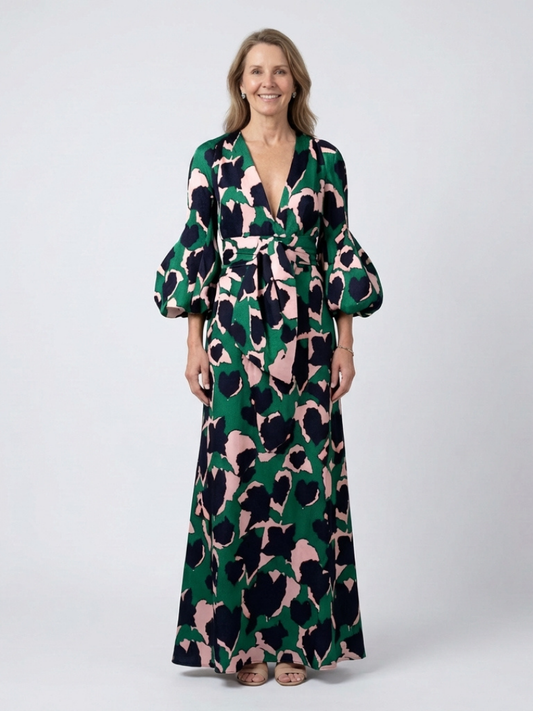 Dark green animal-print maxi dress with V-neck, tie waist, and long puff sleeves