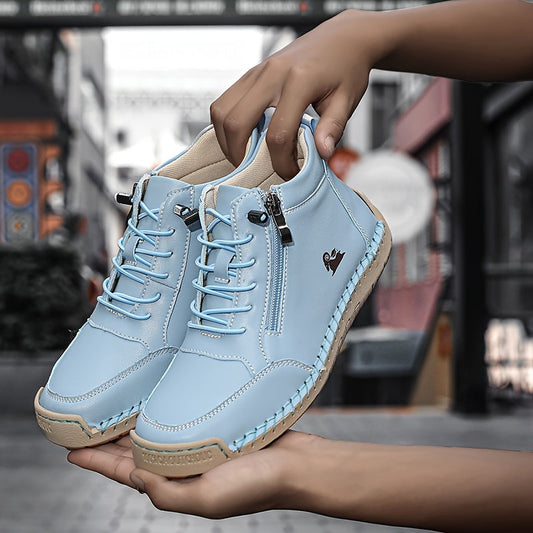 Light blue ergonomic support sneaker with lace-up front, side zipper, and rubber outsole