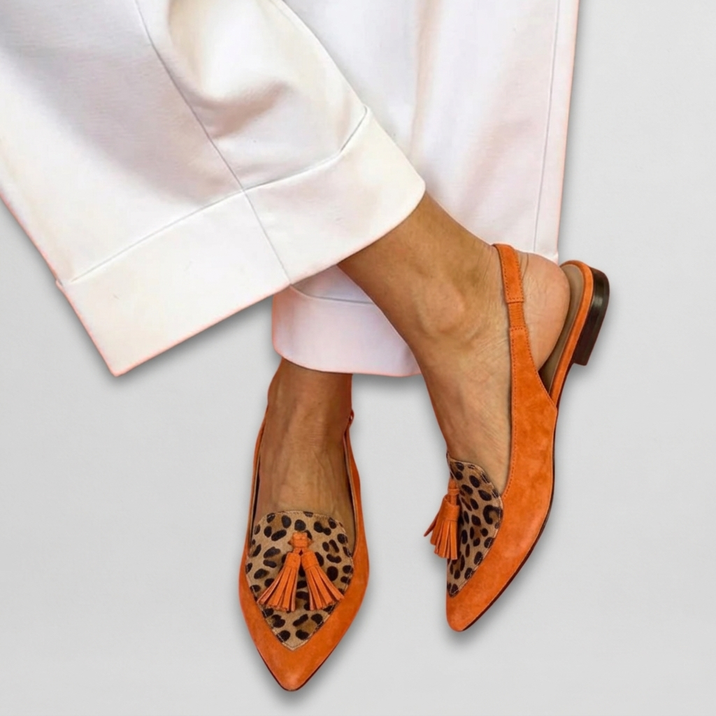 Orange suede fringe strap sandals with leopard print panels and orange tassels