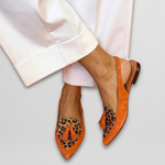Orange suede fringe strap sandals with leopard print panels and orange tassels