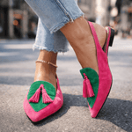 Pink suede fringe strap sandals with green insets and tassel detail on low heel
