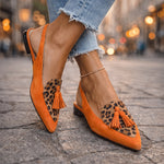 Orange suede fringe strap sandals with leopard print inlays and tassel detail