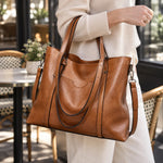 Eleonora vintage leather tote bag in brown, front panel with long crossbody straps