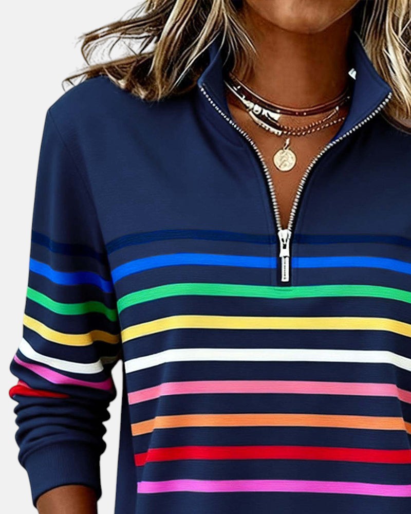 Navy quarter-zip sweatshirt with rainbow striped bands and contrast stripe placket