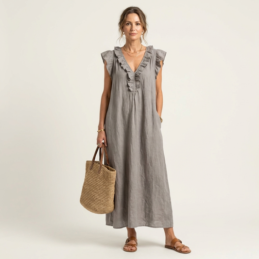 Gray ruffled V-neck maxi gown with sleeveless bodice and gathered front detail.