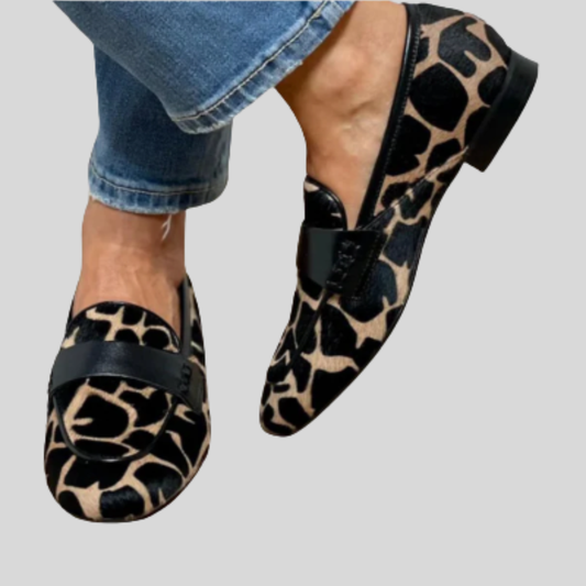 Cushioned soft loafers with leopard-print uppers and black strap detail