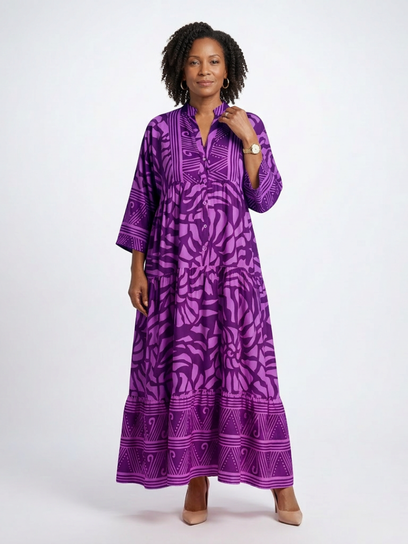 Purple midi button-front dress with V-neck and 3/4 sleeves, tiered skirt, allover print.
